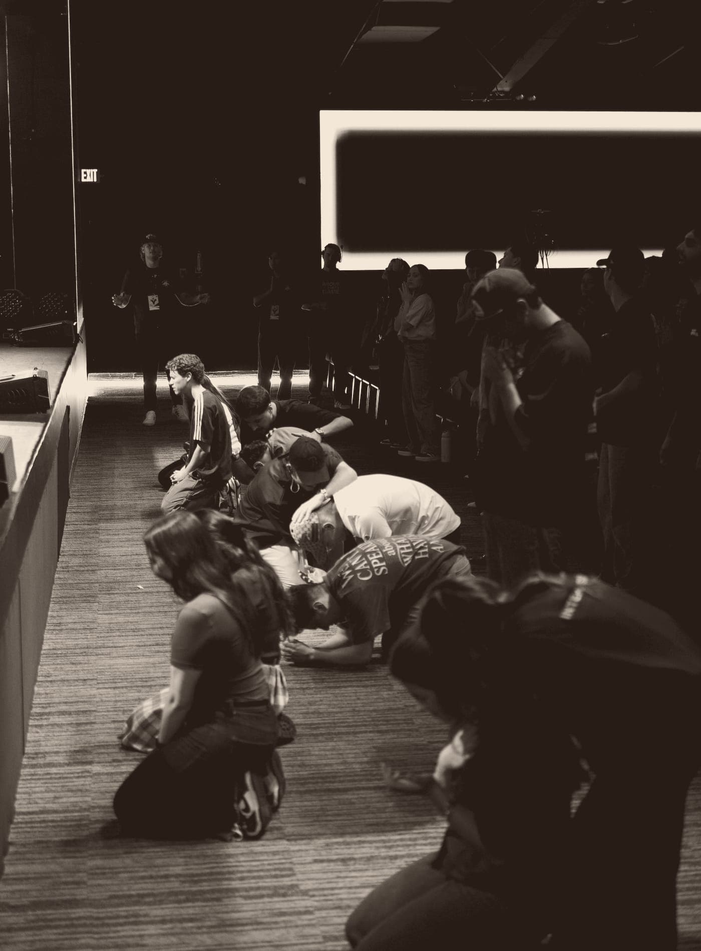 Our people praying together at Legacy Orlando